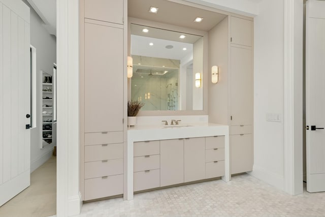 bathroom featuring recessed lighting, a marble finish shower, a closet, and vanity