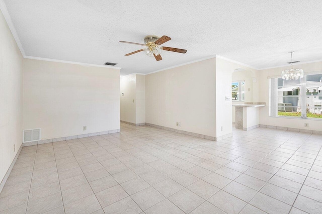 unfurnished living room featuring light tile patterned floors, visible vents, ceiling fan with notable chandelier, and crown molding