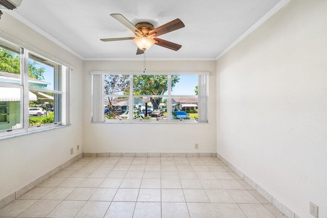 empty room featuring light tile patterned flooring, ceiling fan, and ornamental molding