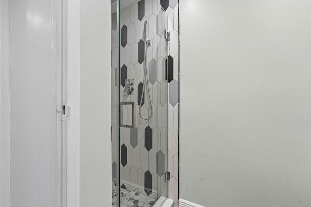 116 Seville D, Delray Beach, FL 33446 - full bathroom with baseboards and a stall shower