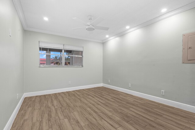 116 Seville D, Delray Beach, FL 33446 - unfurnished room with crown molding, wood finished floors, baseboards, and a ceiling fan