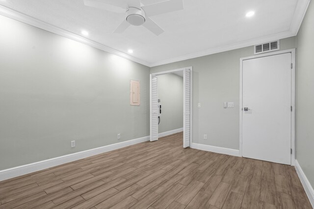 116 Seville D, Delray Beach, FL 33446 - unfurnished bedroom featuring baseboards, ornamental molding, recessed lighting, visible vents, and wood finished floors