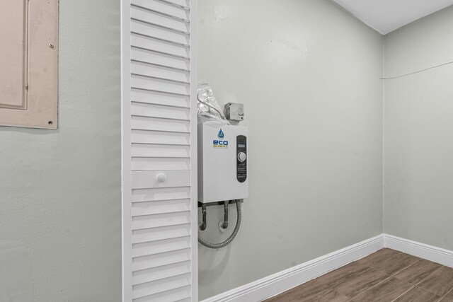 116 Seville D, Delray Beach, FL 33446 - room details with baseboards and wood finished floors