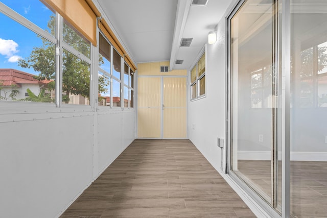 116 Seville D, Delray Beach, FL 33446 - hall featuring wood finished floors and visible vents