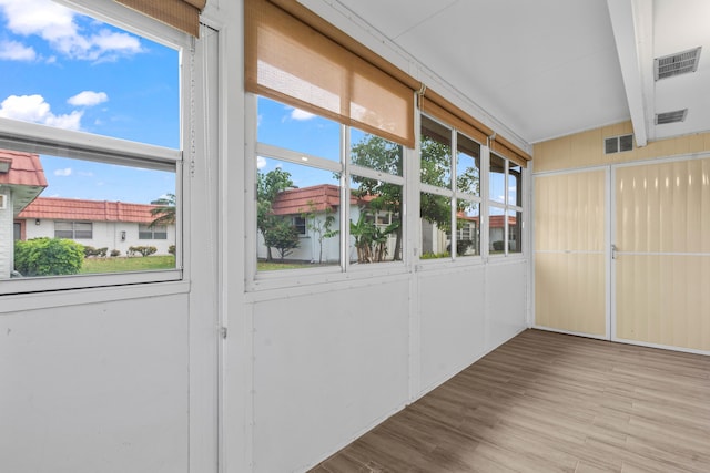 116 Seville D, Delray Beach, FL 33446 - unfurnished sunroom featuring visible vents