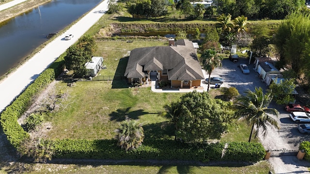 drone / aerial view featuring a water view
