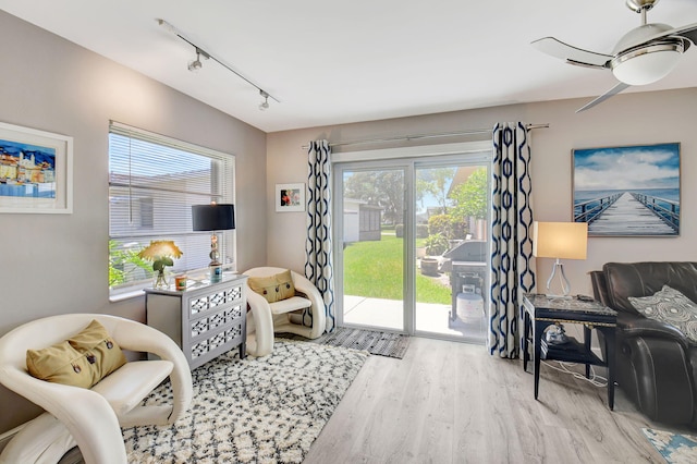 6122 Overland Pl, Delray Beach, FL 33484 - sitting room with ceiling fan, wood finished floors, and track lighting