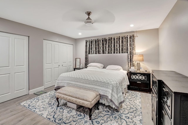 6122 Overland Pl, Delray Beach, FL 33484 - bedroom with recessed lighting, light wood finished floors, two closets, and a ceiling fan