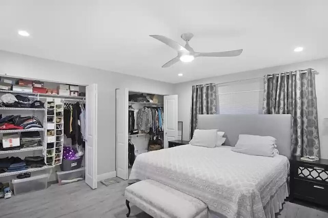 6122 Overland Pl, Delray Beach, FL 33484 - bedroom featuring recessed lighting, two closets, a ceiling fan, and baseboards
