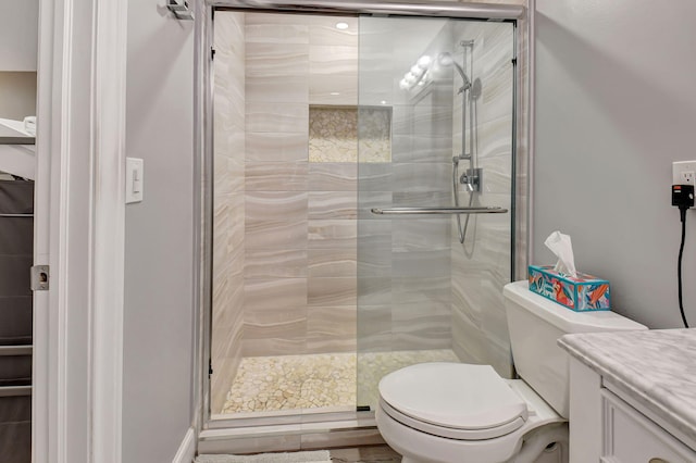 6122 Overland Pl, Delray Beach, FL 33484 - bathroom featuring toilet, vanity, and a stall shower