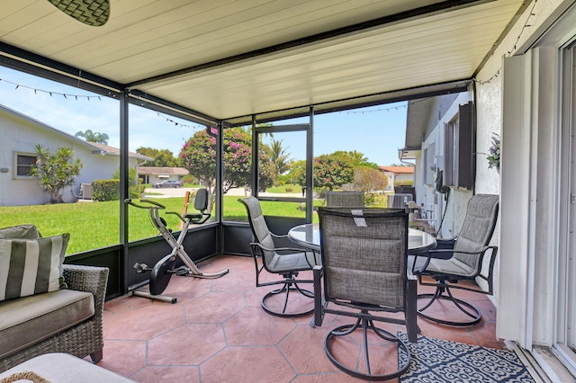 6122 Overland Pl, Delray Beach, FL 33484 - sunroom / solarium with outdoor dining space