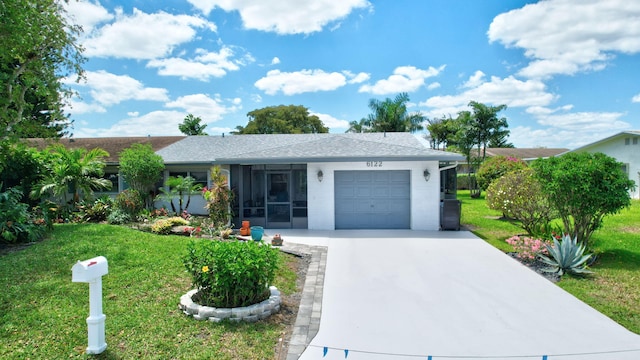 6122 Overland Pl, Delray Beach, FL 33484 - single story home featuring a front lawn, a shingled roof, an attached garage, and driveway