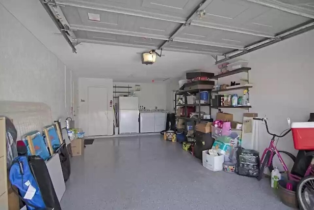 6122 Overland Pl, Delray Beach, FL 33484 - garage with freestanding refrigerator and a garage door opener