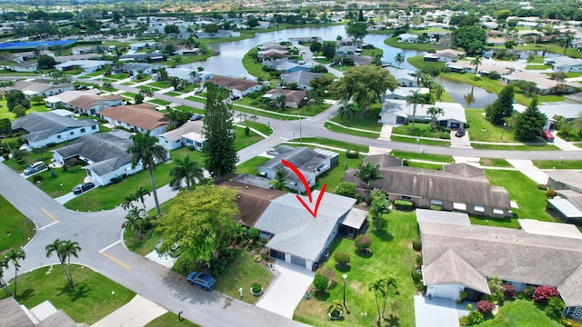 6122 Overland Pl, Delray Beach, FL 33484 - drone / aerial view featuring a residential view and a water view