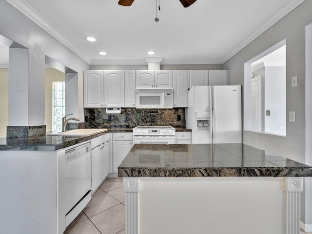 kitchen with ceiling fan, a sink, white appliances, crown molding, and white cabinetry