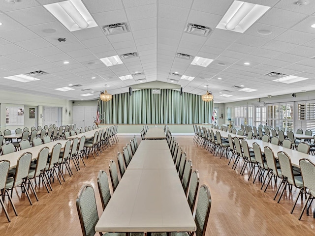 dining space with visible vents and light wood finished floors
