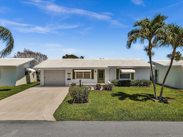 single story home featuring a front lawn, driveway, a tiled roof, a garage, and stucco siding