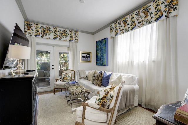 359 E Lakewood Rd, West Palm Beach, FL 33405 - living room featuring french doors, crown molding, and wood finished floors