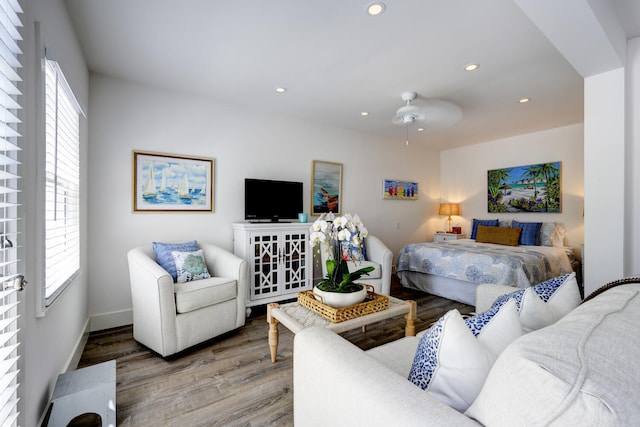 359 E Lakewood Rd, West Palm Beach, FL 33405 - living room with a healthy amount of sunlight, wood finished floors, a ceiling fan, and recessed lighting
