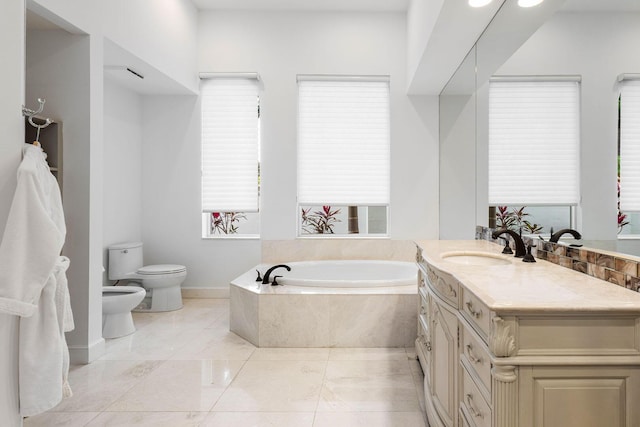 full bathroom with a bath, a wealth of natural light, a bidet, and toilet