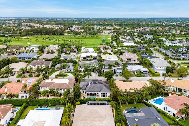 aerial view with a residential view and view of golf course