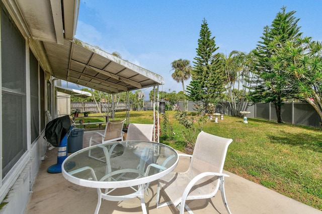 view of patio / terrace featuring outdoor dining area and a fenced backyard