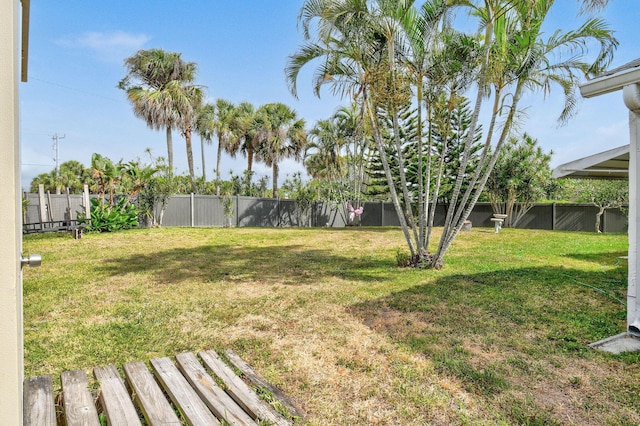 view of yard with a fenced backyard