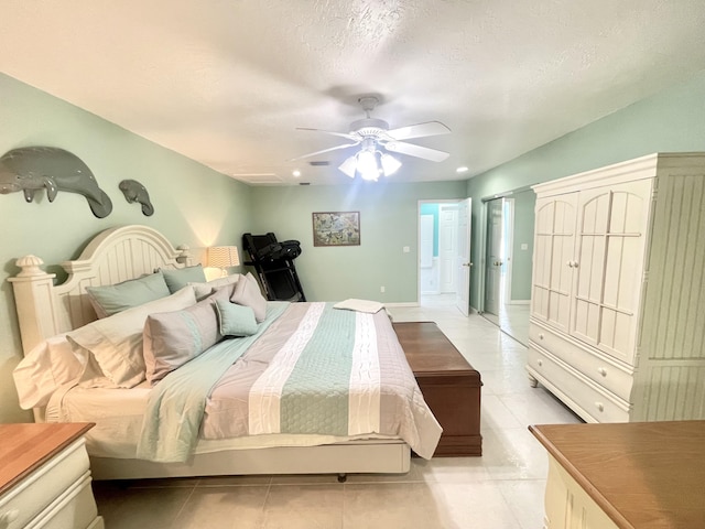 bedroom featuring light tile patterned floors and a ceiling fan