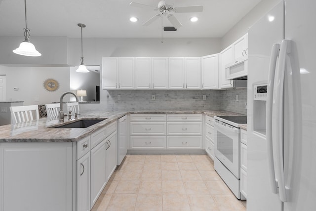 kitchen featuring a sink, a ceiling fan, white appliances, white cabinetry, and backsplash