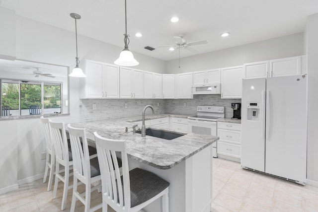 kitchen featuring a ceiling fan, white cabinetry, a sink, and white appliances
