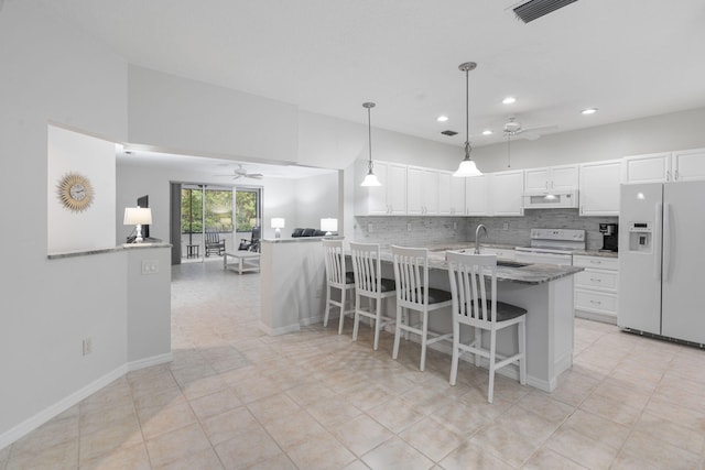 kitchen with recessed lighting, white appliances, visible vents, and a ceiling fan