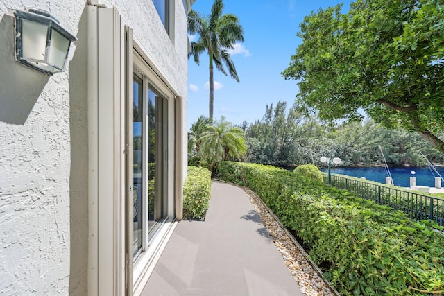 2880 NE 14th Street Cswy Unit 113, Pompano Beach, FL 33062 - exterior space featuring a water view and fence