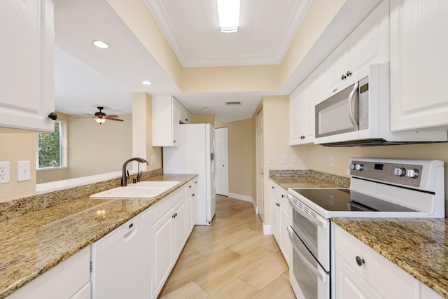 2880 NE 14th Street Cswy Unit 113, Pompano Beach, FL 33062 - kitchen with white cabinetry, white appliances, recessed lighting, and a sink