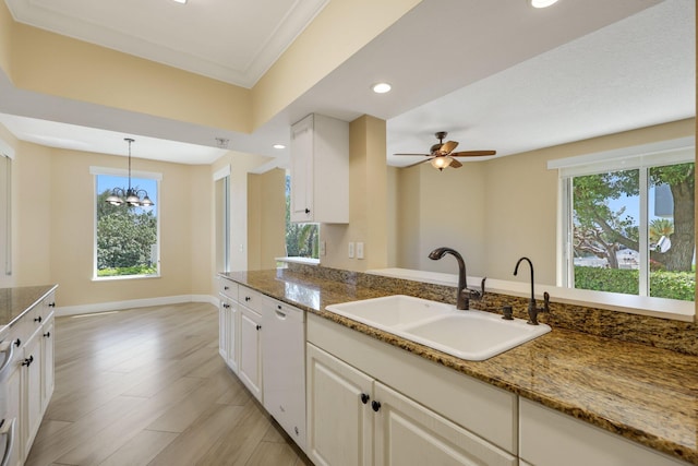 2880 NE 14th Street Cswy Unit 113, Pompano Beach, FL 33062 - kitchen featuring a sink, recessed lighting, white dishwasher, white cabinets, and baseboards