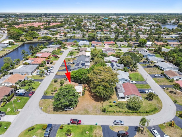 7000 NW 95th Ter, Tamarac, FL 33321 - drone / aerial view featuring a water view and a residential view