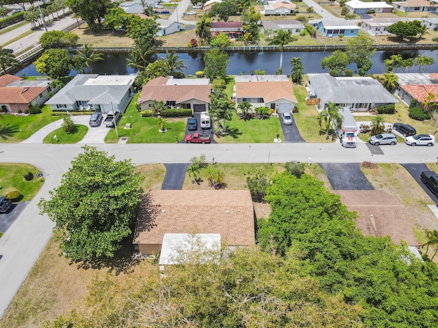 7000 NW 95th Ter, Tamarac, FL 33321 - bird's eye view with a residential view and a water view