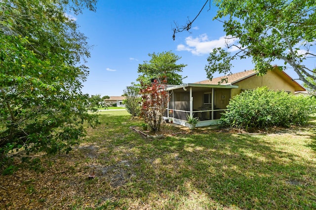 7000 NW 95th Ter, Tamarac, FL 33321 - view of yard featuring a sunroom
