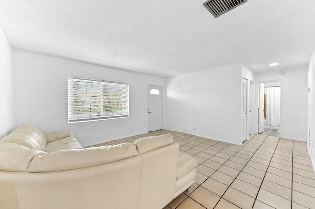 7000 NW 95th Ter, Tamarac, FL 33321 - living room featuring visible vents and light tile patterned floors
