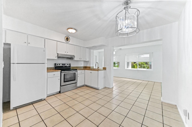 7000 NW 95th Ter, Tamarac, FL 33321 - kitchen featuring freestanding refrigerator, under cabinet range hood, white cabinets, a sink, and stainless steel range with electric cooktop