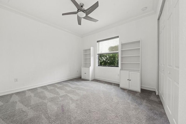 9600 Equus Cir, Boynton Beach, FL 33472 - unfurnished bedroom with crown molding, carpet flooring, a closet, and baseboards