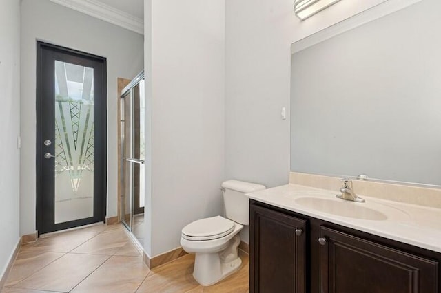 9600 Equus Cir, Boynton Beach, FL 33472 - bathroom with ornamental molding, toilet, vanity, a stall shower, and baseboards