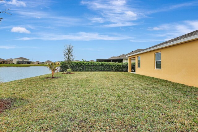 10771 SW Cremona Way, Port Saint Lucie, FL 34987 - back of property with stucco siding and a patio area