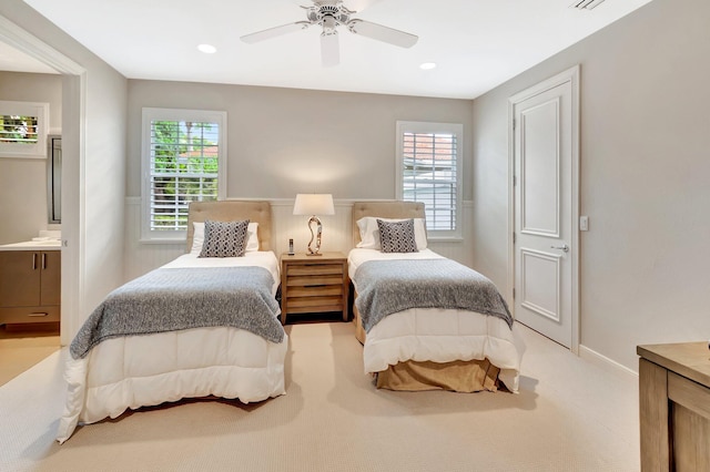 17652 Lake Estates Dr, Boca Raton, FL 33496 - bedroom featuring baseboards, multiple windows, ensuite bathroom, and carpet