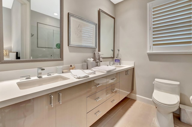 17652 Lake Estates Dr, Boca Raton, FL 33496 - bathroom with a sink, double vanity, toilet, baseboards, and a shower stall