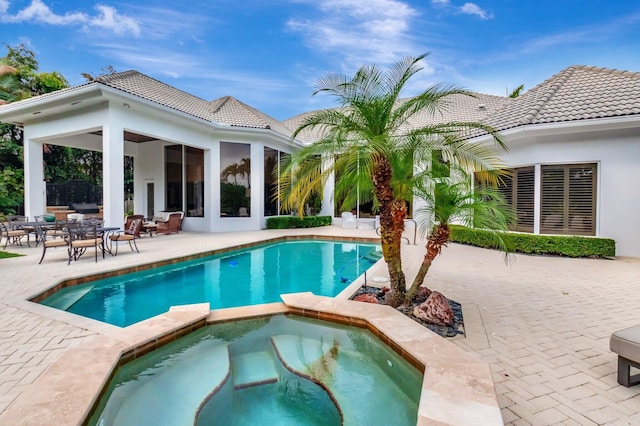 17652 Lake Estates Dr, Boca Raton, FL 33496 - view of pool featuring a patio and a pool with connected hot tub