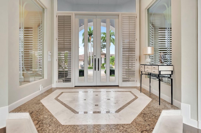 17652 Lake Estates Dr, Boca Raton, FL 33496 - foyer featuring french doors and baseboards