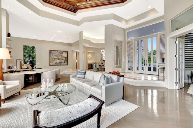 17652 Lake Estates Dr, Boca Raton, FL 33496 - living area with a towering ceiling, a healthy amount of sunlight, a tray ceiling, and recessed lighting