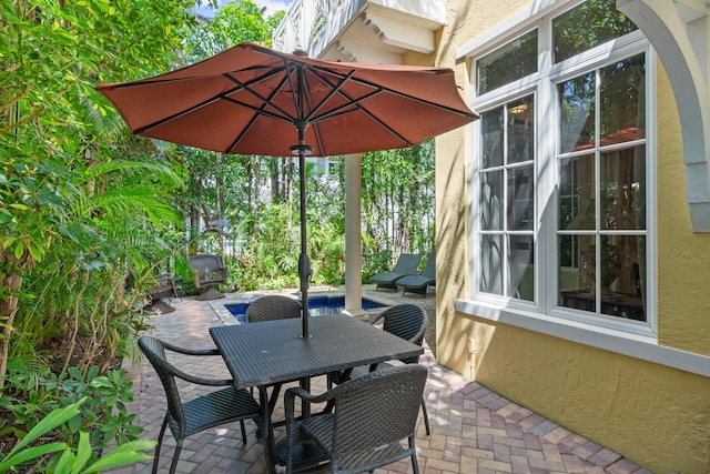 view of patio featuring outdoor dining space