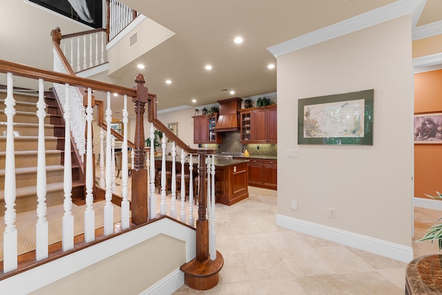 stairs with baseboards, visible vents, recessed lighting, and crown molding