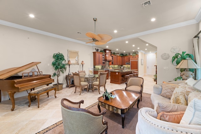 living room featuring a ceiling fan, visible vents, recessed lighting, and ornamental molding